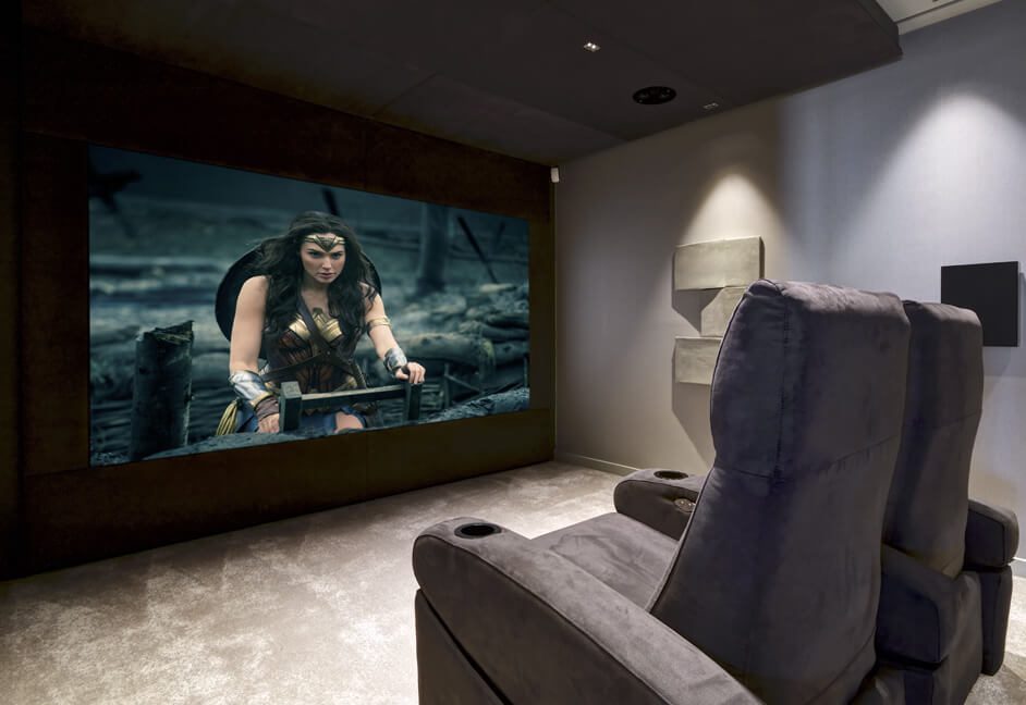 Concealed home cinema speakers and acoustic wall treatment
